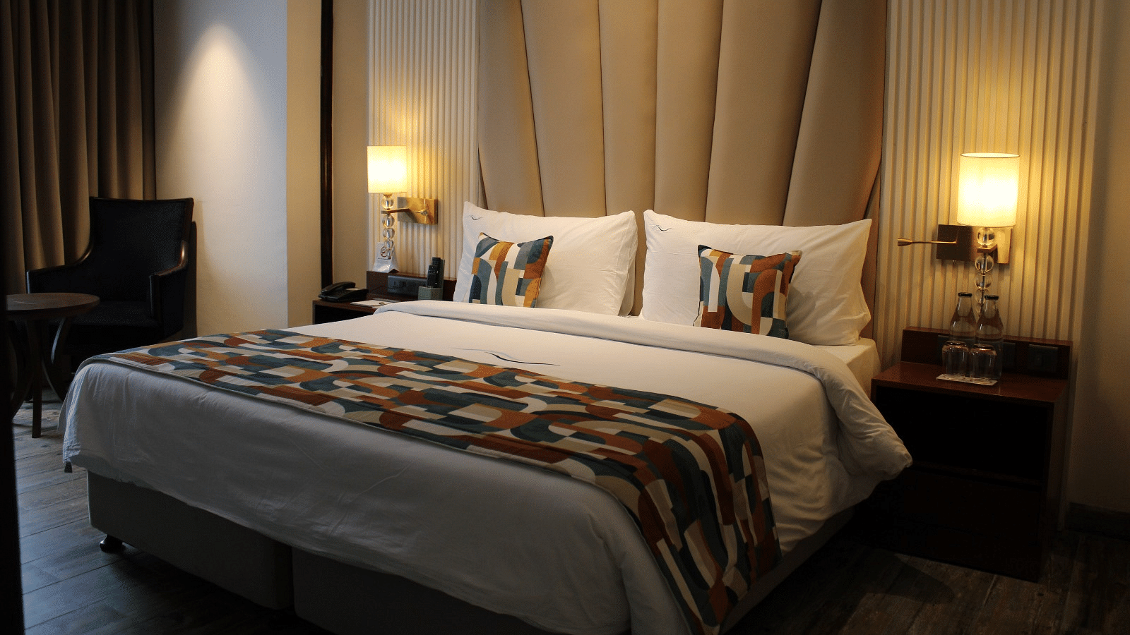 A bedroom featuring a functional working space for productivity at BluSalzz Residence, Amritsar